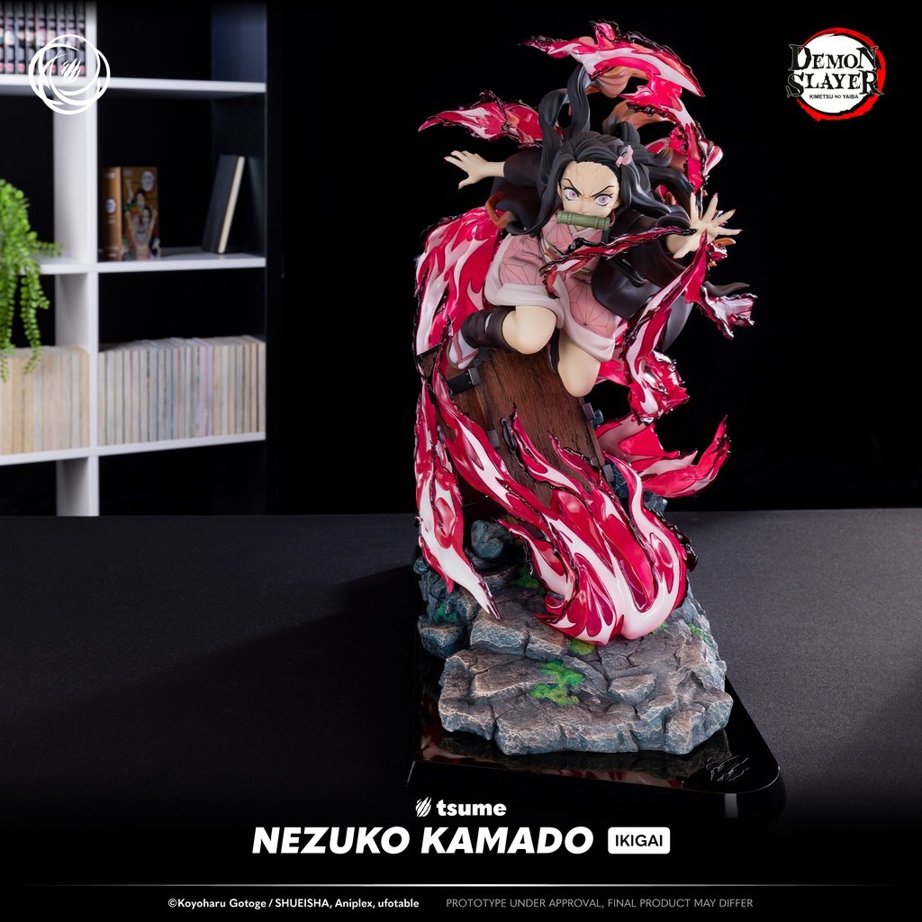Nezuko Kamado figurine from Demon Slayer on a dark background with 'tsume' branding.