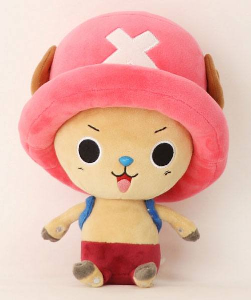 Plush toy with a pink hat and red pants on a light pink background