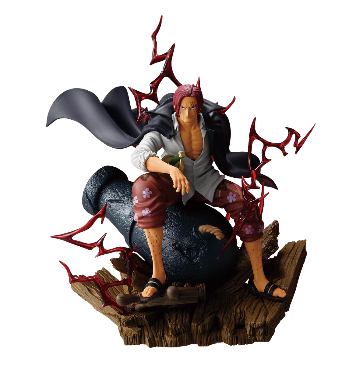A collectible anime figurine of the character Sabo from One Piece, posed sitting on a cannon atop a wooden base with red energy crackling effects, isolated on a white background.