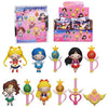 Collection of Sailor Moon-themed figurines and packaging on a white background