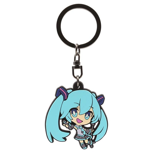 Keychain with an anime character featuring blue hair and a black ring on a white background