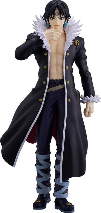 Action figure in a long black coat with white accents on a white background