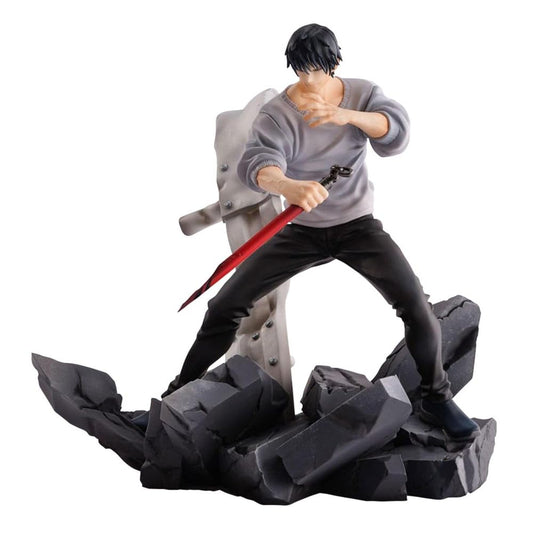 Figurine of a character in a dynamic pose with a sword on a white background