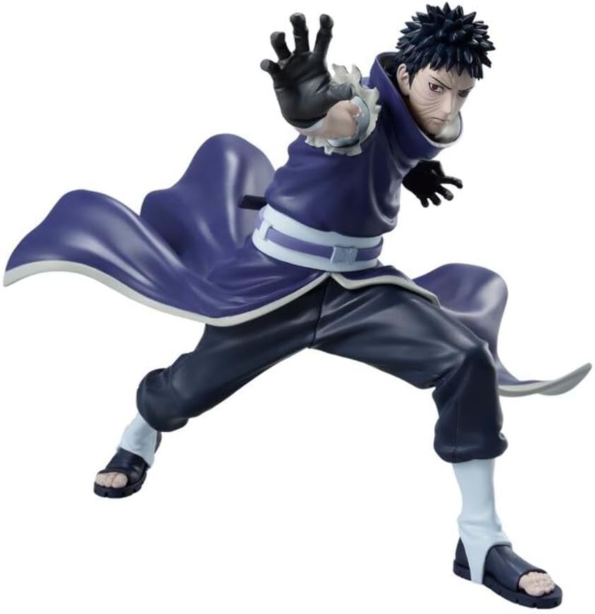 Action figure in a dynamic pose with a blue outfit and black hair on a white background