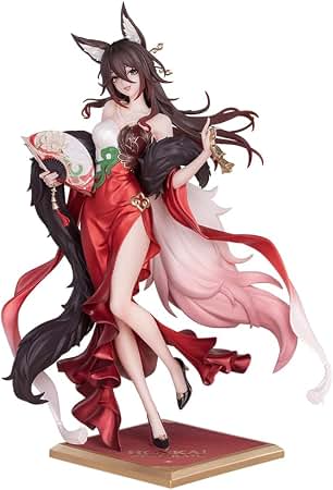 A detailed anime-style female figurine with long dark hair, fox ears, and flowing red and pink garments, posed on a decorative base against a plain white background.