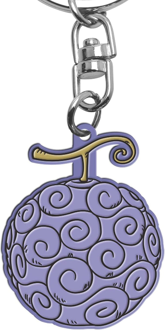 A One Piece anime keychain featuring the Black Court Fruit (Chop Suey) design. The keychain has a silver metal split ring and clasp, with a purple fruit charm decorated with black swirl patterns and a gold-colored stem.