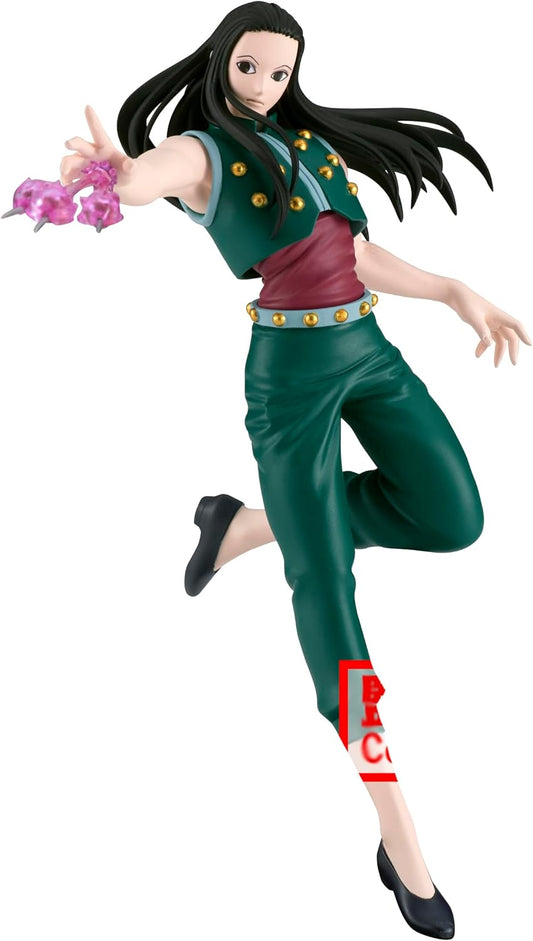 Action figure of a character in green outfit with pink gem on white background