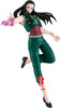 Action figure of a character in green outfit with pink gem on white background