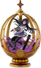 An anime figurine of a female character inside a golden egg-shaped display case with purple and black decorative elements, shown on a plain white background.