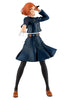 Figure of a character in a blue outfit with a white background