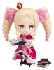 Animated character figurine with pink hair and outfit, holding a book on a white background
