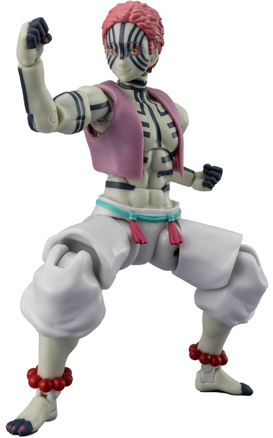 Action figure with pink hair and white outfit on a white background