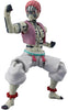 Action figure with pink hair and white outfit on a white background