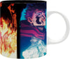 A white ceramic mug featuring a split anime-style print: one side shows a fiery character in orange and yellow tones, and the other shows a blue-haired character in a red scarf against a dark blue background.