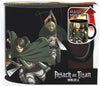 Attack on Titan themed ceramic mug in its retail packaging, featuring anime characters Levi, Mikasa, and Erwin with a graphic showing the mug's heat-reactive design.