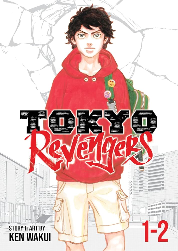 Manga book cover of 'Tokyo Revengers' with a character in a red hoodie and cityscape background.