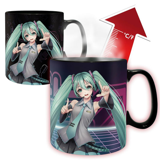 A black ceramic mug featuring an anime-style character with long teal pigtails and a gray-and-teal outfit, shown in two views on a white background. One view shows the mug fully colored, and the other shows a red arrow with °C/F text indicating a color-changing temperature effect.