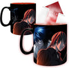 A black ceramic mug featuring anime character artwork with red and blue hair, shown from multiple angles on a white background. A red arrow graphic with °C/F text appears near the top right, suggesting a temperature-changing mug feature.