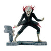 A detailed anime collectible figurine of the character Tanjiro Kamado from Demon Slayer, posed dynamically on a gray stone-like base against a solid white background.