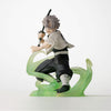 A detailed anime figurine of a character in a dynamic crouching pose, holding a sword and standing on a translucent green energy-like base, photographed against a clean white background.