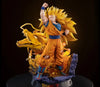 Dragon Ball Z Super Saiyan Gohan collectible statue in a dynamic fighting pose with his golden dragon behind him, displayed on a black background.