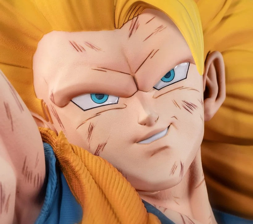 Close-up of an anime collectible figure showing a character with bright yellow hair, blue eyes, and a blue outfit against a matching yellow background.