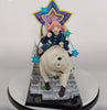 A detailed anime figurine of a girl with pink hair riding a large white dog, set against a star-shaped backdrop on a gray icy base, displayed on a white and black rotating stand.