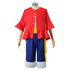 Colorful outfit on a mannequin with red top, blue pants, and yellow accents on a white background
