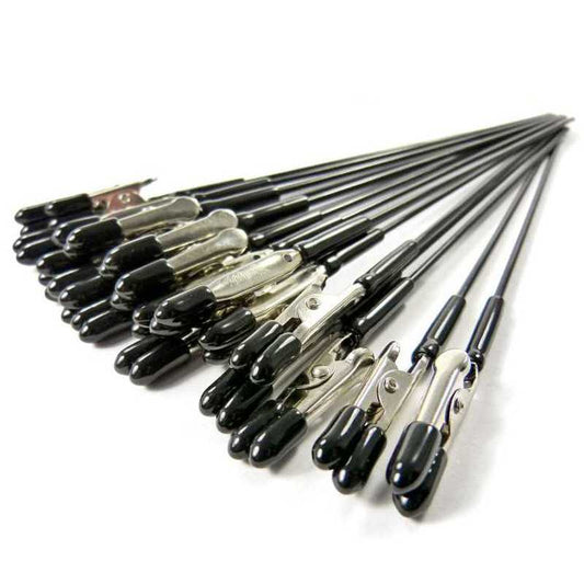 Set of black and silver hair styling tools on a white background