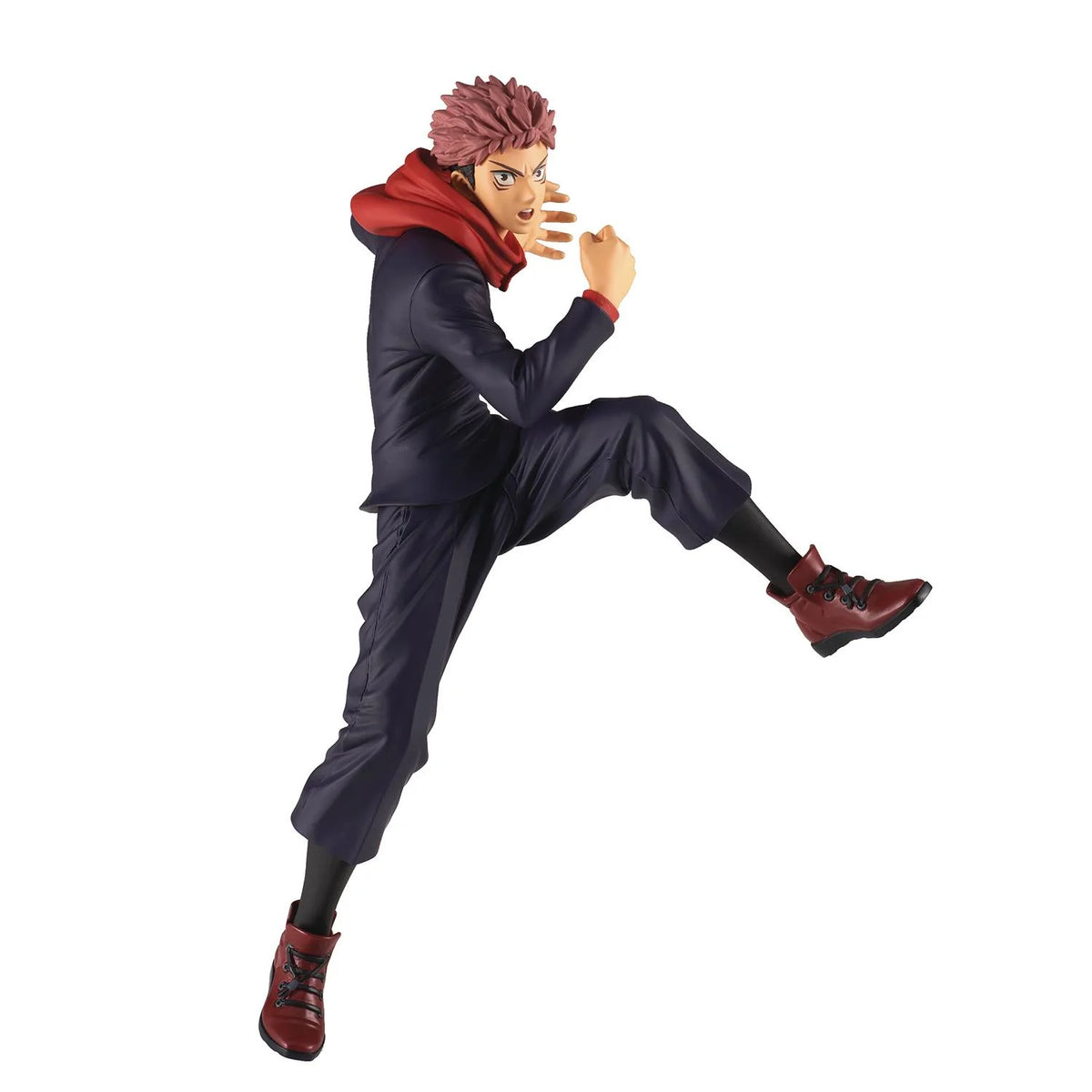 A collectible action figure of the anime character Yuji Itadori in a dynamic kicking pose, wearing a navy blue tracksuit, red hooded scarf, and red boots, isolated on a white background.