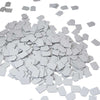 Gray square tiles scattered on a white background