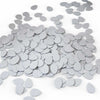 Gray tear-shaped confetti on a white background