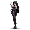 A collectible figurine of a female anime character with long black hair, wearing a black strapless dress and gloves with pink accents, posed against a plain white background.