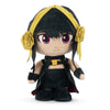 Plush toy with black hair, red eyes, and yellow headband on a white background