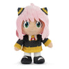 Plush toy of an anime character with pink hair and green eyes on a white background