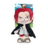 Plush toy of a character with red hair and black coat on a One Piece branded card.