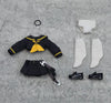 Toy outfit pieces including a jacket, skirt, shoes, and accessories on a textured gray surface.
