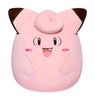 Plush toy of a pink character with brown ears on a white background