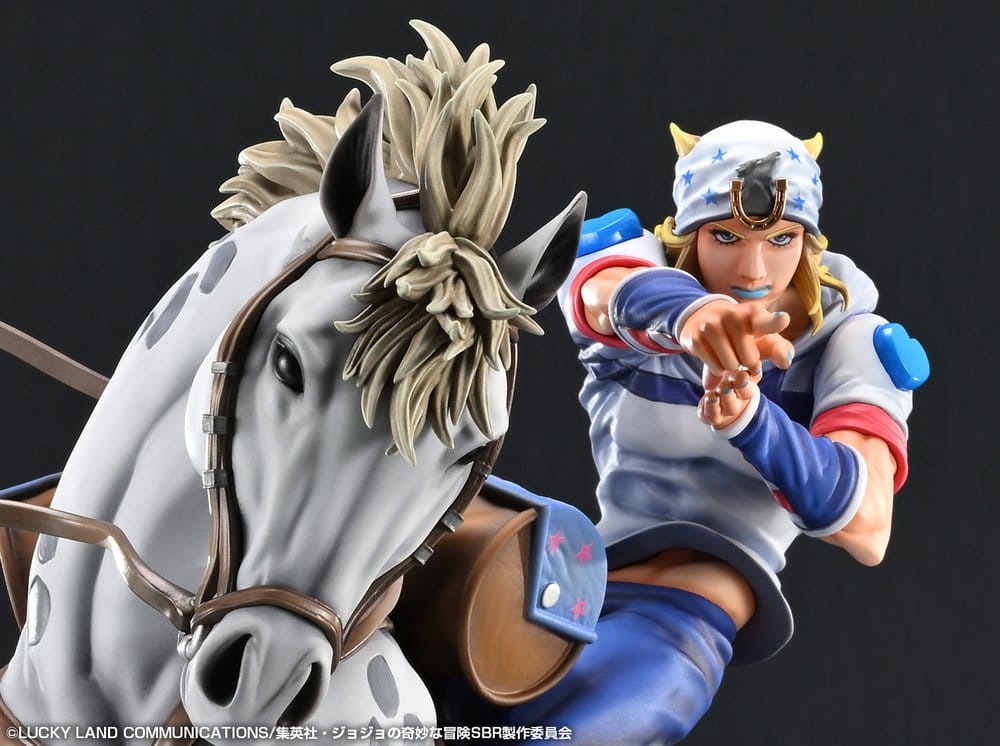 A detailed collectible figurine of a blonde character in a blue and white outfit riding a white horse, posed against a dark background. The figure is pointing forward with one hand while holding the reins with the other.