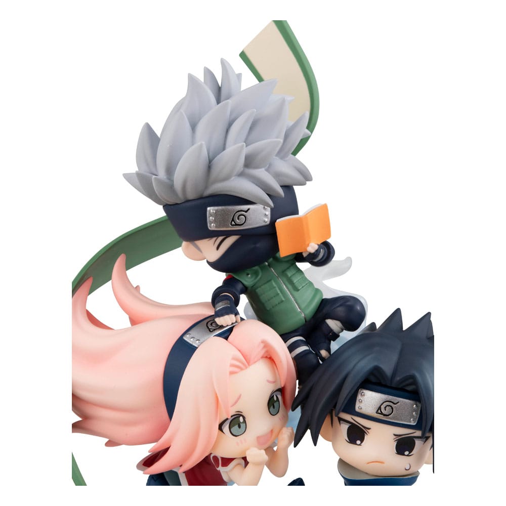Three anime character figurines on a white background