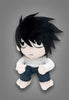 Plush toy with spiky black hair and white face on a gray background