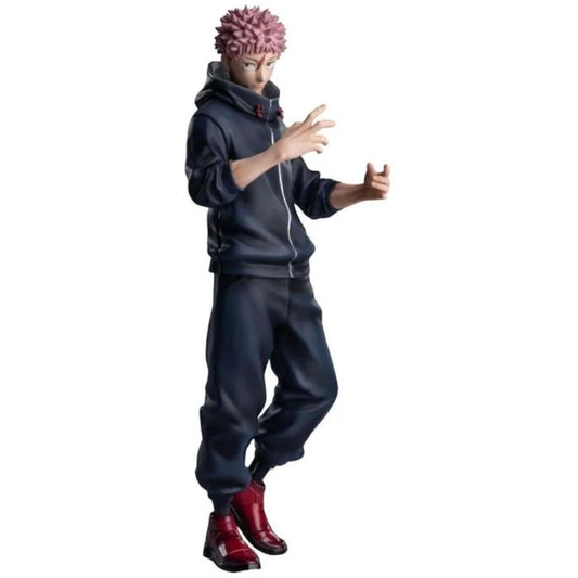 A collectible action figure of the character Satoru Gojo from Jujutsu Kaisen, wearing a dark navy blue zip-up hoodie and sweatpants with pink hair and red boots, set against a plain white background.